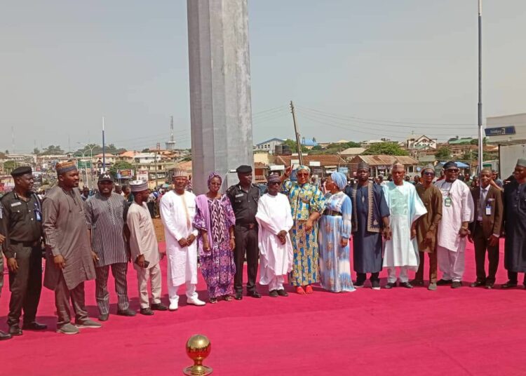 Kwara State government functionaries at the official hoisting of the 70- metre Unity  flagpole in Ilorin, the state capital on Monday. Photo by Abdullahi Olesin, Ilorin.