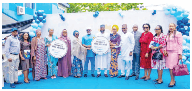 Representative of the president, Nigerian Society of Engineers, Engr. Mistura Adenike Rafiu (4th from left); senior special assistant to the president on citizens and leadership, Mrs Rinsola Abiola (5th from left); permanent secretary, Ministry of Women Affairs, Mrs. Maryam Chira Keshinro (6th from left); chairman, Senate Committee on NASENI, Senator Francis Ezenwa Onyewuchi (7th from left); EVC/CEO of NASENI, Mr  Khalil Suleiman Halilu (8th from left); mandate secretary, Women Affairs Secretariat, FCTA, Dr Adedayo Benjamins- Laniyi (6th from right); chairman of Presidential Implementation Committee on Technology Transfer, Dr. Mohammed Dahiru (5th from right); executive director, North and Public Sector, Fidelity Bank, Mr Sufiyani Garba (4th from right); NASENI’s coordinating director, planning and business development, Dr Nonyem Onyechi (3rd from right) and others at the launch of DELT-Her proposal portal for female engineers at NASENI Headquarters, Abuja