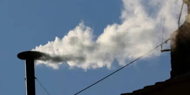 White smoke billowing from the chimney on the Sistine Chapel, on Thursday.