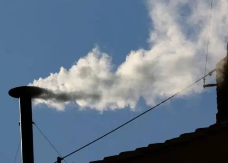 White smoke billowing from the chimney on the Sistine Chapel, on Thursday.