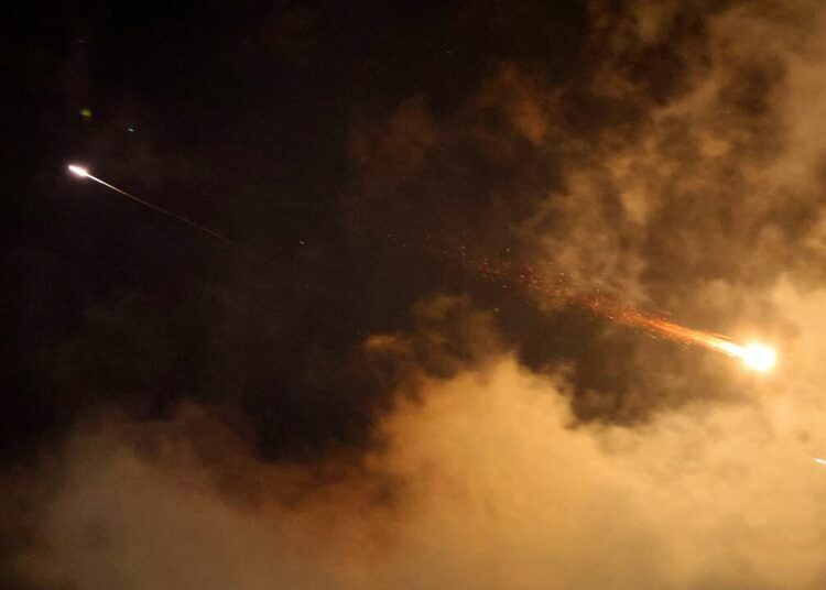 Rocket trails are seen in the sky above the Israeli coastal city of Netanya amid a fresh barrage of Iranian missile attacks on June 21, 2025. Israel's war with Iran entered its second week with the Israeli military chief warning of a "prolonged campaign" and Tehran ruling out further nuclear talks with the United States until Israel halts its attacks. (Photo by JACK GUEZ / AFP) (Photo by JACK GUEZ/AFP via Getty Images)