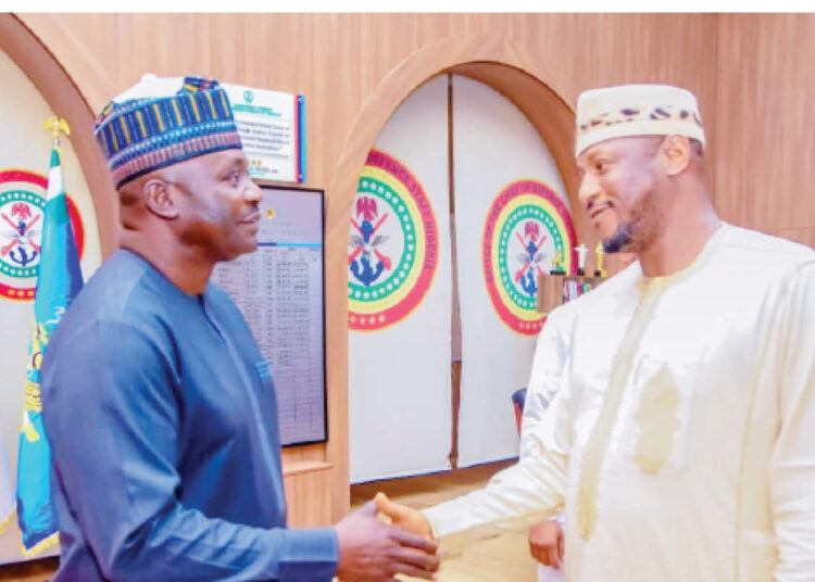 Gov Umaru Dikko Radda (Right)  exchanging pleasantries with the Chief of Defence Staff, Gen.  Christopher Musa at the defence headquarters, Abuja.