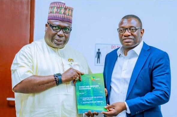 Bala Wunti Exits NNPC, Reflects On Decades Of Impactful Leadership 1 L-R: Acting Head, Health, Safety and Environment (HSE), NNPC, Mr Akpabio Essien and erstwhile Head of the Division, Mr Bala Wunti, during the handover ceremony in Abuja
