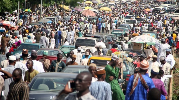 11 Million Enrolled As State Health Agencies Map Out UHC Plan 1 Nigerians crowd population e1542134000871