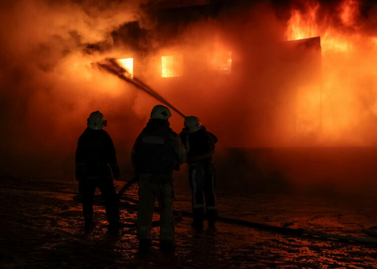 Firefighters work at the site of a Russian drone strike, amid Russia's attack on Ukraine, in Kharkiv, Ukraine February 10, 2024. REUTERS/Sofiia Gatilova