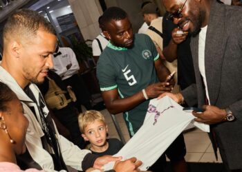 PICTORIAL: Football Fans Throng Lagos Mall To Meet Troost-Ekong Ahead Charity Game