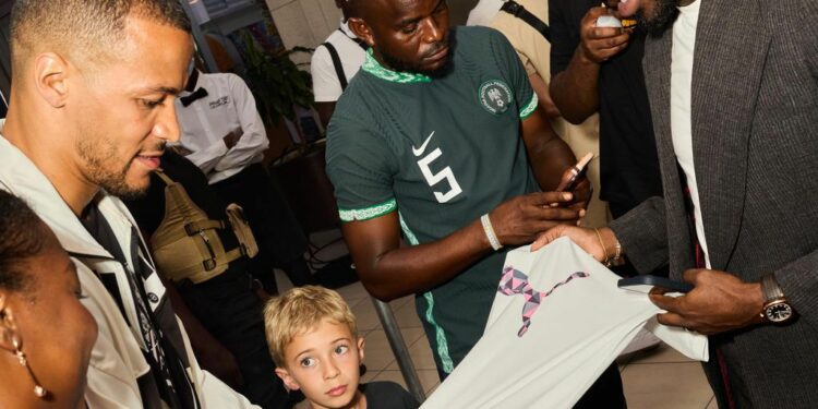 Football Fans Throng Lagos Mall To Meet Troost-Ekong Ahead Of Charity Game