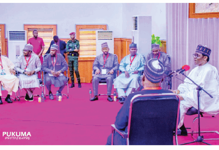 Yobe governor  Hon Mai Mala Buni (Second Right) during a town hall meeting at the banquet Hall, Government House , Damaturu