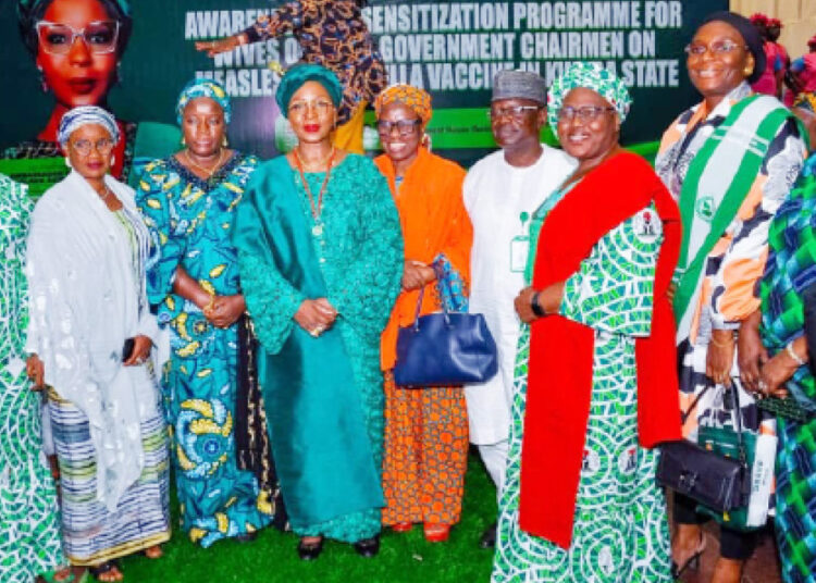 First Lady of Kwara State, Amb. Olufolake AbdulRazaq(5th left) and spouses of LG chairmen at a sensitisation programme on the forthcoming measles and rubella vaccination exercise in the state. PHOTO BY ABDULLAHI OLESIN, ILORIN