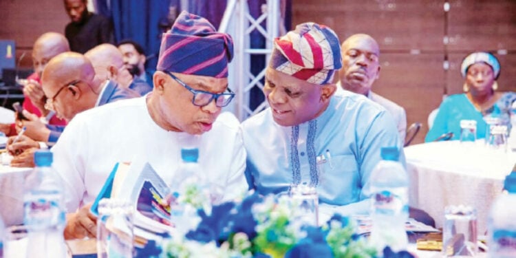 R-L: Executive Secretary, Nigerian Shippers Council (NSC), Dr Pius Akutah and the Managing Director, National Inland Waterways Authority (NIWA), Bola Oyebamiji, at an event recently.