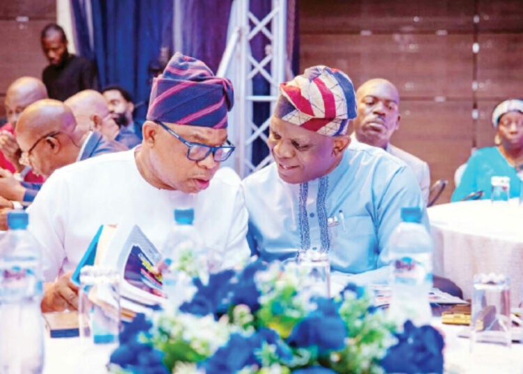 R-L: Executive Secretary, Nigerian Shippers Council (NSC), Dr Pius Akutah and the Managing Director, National Inland Waterways Authority (NIWA), Bola Oyebamiji, at an event recently.