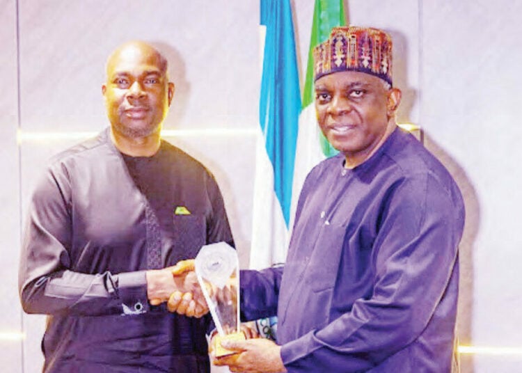 L-R: Tanzanian High Commissioner to Nigeria, Ambassador Selestine Kakele in a handshake with the Executive Secretary, Nigerian Shippers' Council, Dr Pius Akutah, when he led a 19-member delegation from the United Republic of Tanzania to the NSC Headquarters in Lagos