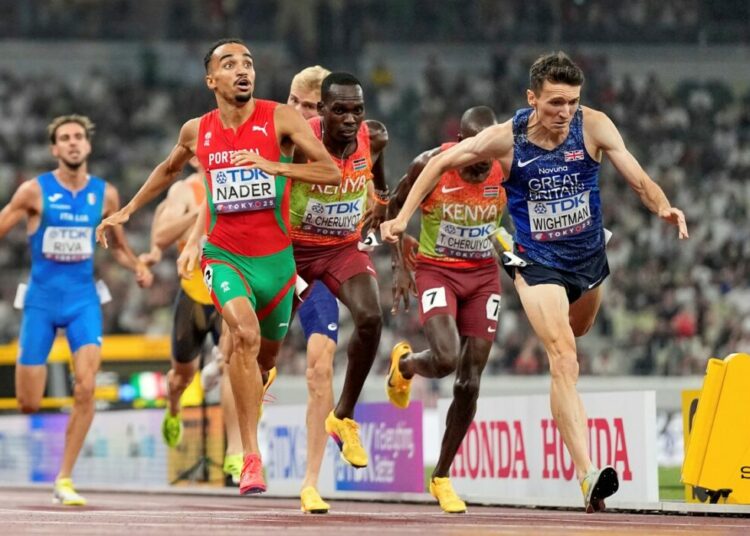 Portugal's Isaac Nader Clinches World Men's 1,500m Gold 1 Portugal's Isaac Nader celebrates after winning the gold medal ahead of Britain's Jake Wightman in the men's 1,500 meters final at the World Athletics Championships in Tokyo, Wednesday, Sept. 17, 2025. (AP Photo/Petr David Josek)