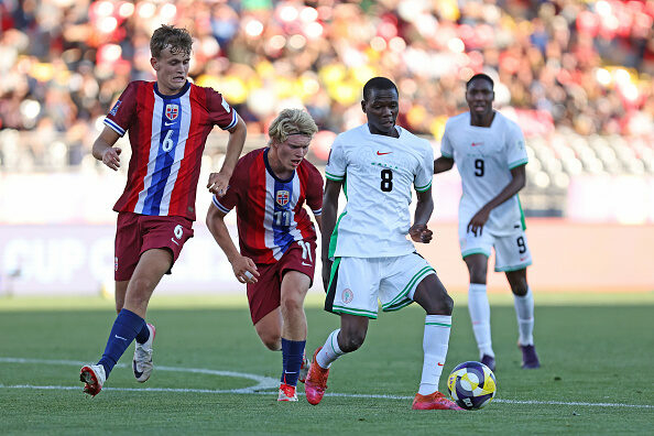 Flying Eagles Suffer Narrow Defeat To Norway In U20 World Cup Opener 1 TALCA, CHILE - SEPTEMBER 29: Abduljelil Kamaldeen of Nigeria runs with the ball against Bork Bang-Kittilsen and Kasper Saetherbo of Norway during the FIFA U-20 World Cup Chile 2025 Group F match between Norway and Nigeria at Estadio Fiscal on September 29, 2025 in Talca, Chile. (Photo by Ricardo Moreira - FIFA/FIFA via Getty Images)