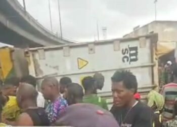 Police Officer, Passenger Die As 40ft Container Crushes Tricycle In Lagos