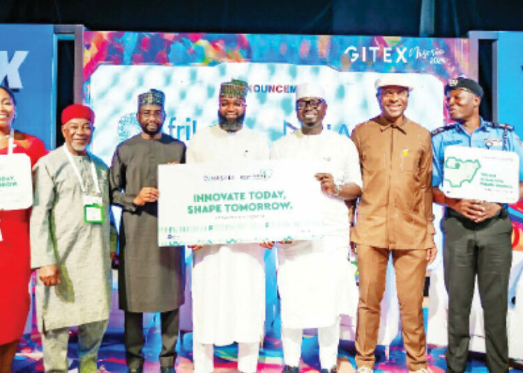Director-General of  NITDA, Kashifu Inuwa (3rd  from left); EVC/CEO of NASENI,  Khalil Suleiman Halilu (centre), and Minister of Youth Development,  Comrade Ayodele Olawande (3rd from right) and others at the unveiling of Innovate Naija Challenge at GITEX Nigeria last week.