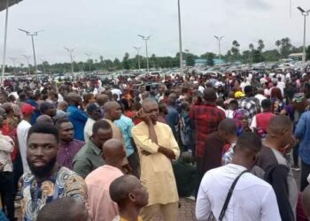 PICTORIAL: Supporters Storm Port Harcourt Airport To Receive Fubara