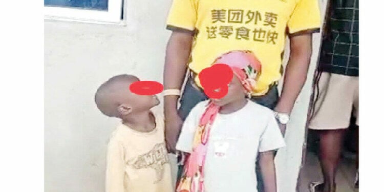 The two children abandoned at OPM gate with their father.