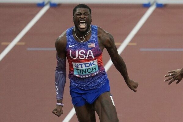 American Tinch Wins Gold In Men's 110m Hurdles At World Championships 1 download