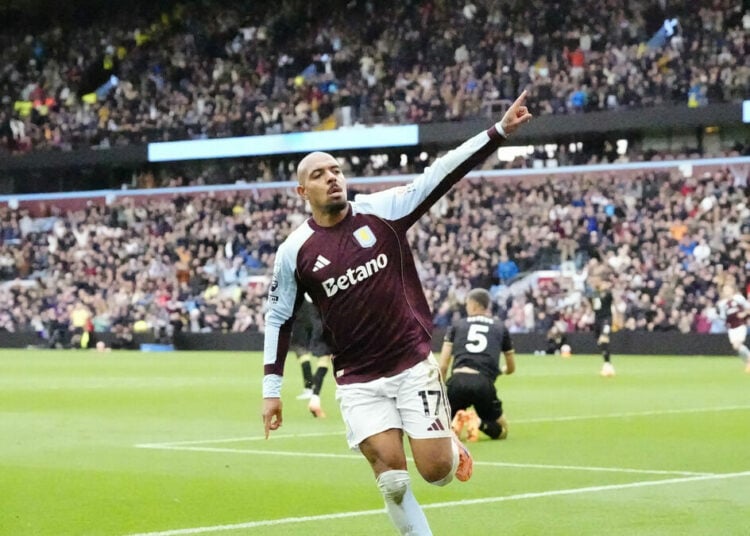 Aston Villa's Donyell Malen celebrates scoring their side's second goal of the game during the Premier League match at Villa Park, Birmingham. Picture date: Sunday October 5, 2025.