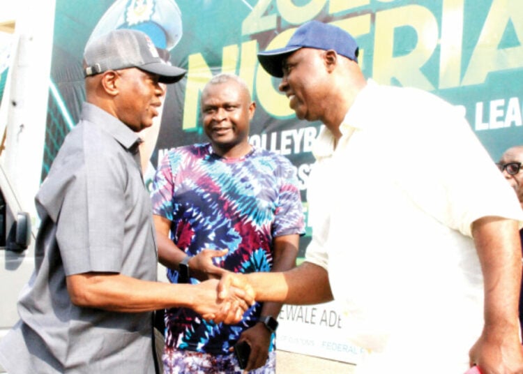 1st Vice president of Nigeria Volleyball Federation, Prince Babatunde Omisore (R)welcoming the Comptroller General of Customs Service, Adewale Adeniyi (L) while the Sport Secretary Nigeria Customs Service, Samuel Onikeku looks on at the ongoing 2025 Nigeria National Volleyball Premier League held in Abuja yesterday. Photo by Gbenga Folorunsho Abiola.