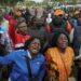 PICTORIAL: Flights Suspended As Kenyans Flood Airport To Receive Raila Odinga’s Body