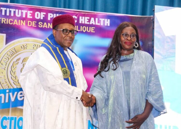 Akor Gets Public Health Journalism Award 1 Coordinating Minister of Health and Social Welfare Prof Muhammad Ali Pati presenting Public Health Journalism Award to Ojoma Akor