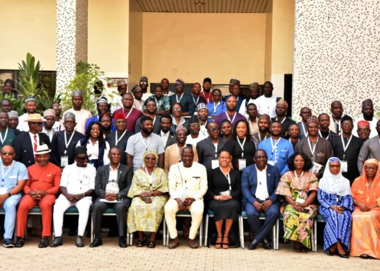 259 Mining Engineers, Geoscientists Inducted As Minister Calls For Ethical Standards 1 Sitting: the Registrar/CEO, Council of Nigerian Mining Engineers and Geosciences (COMEG), Prof. Zacheus Opafunso, Esq. (6th left), the President, Nigerian Mining and Geoscientists Society (NMGS), Mrs Rose Ndong (5th left), Principal Consultant, Groundscan Services, Prof. Tamunoene Abam (4th left), Deputy Vice Chancellor, Benson Idahosa University, Prof. Akpoghome Uzoamaka, Esq. (5th right) and the immediate Past President, NMGS, Prof. Shedrack Olatunji (4th right)
