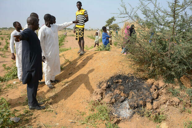 How Villagers Picked Fragments From US Strike Scene – Village Head 1 People visit the site of a U.S. airstrike in Northwest, Jabo, Nigeria, Friday, Dec. 26, 2025. (AP Photo/ Tunde Omolehin)