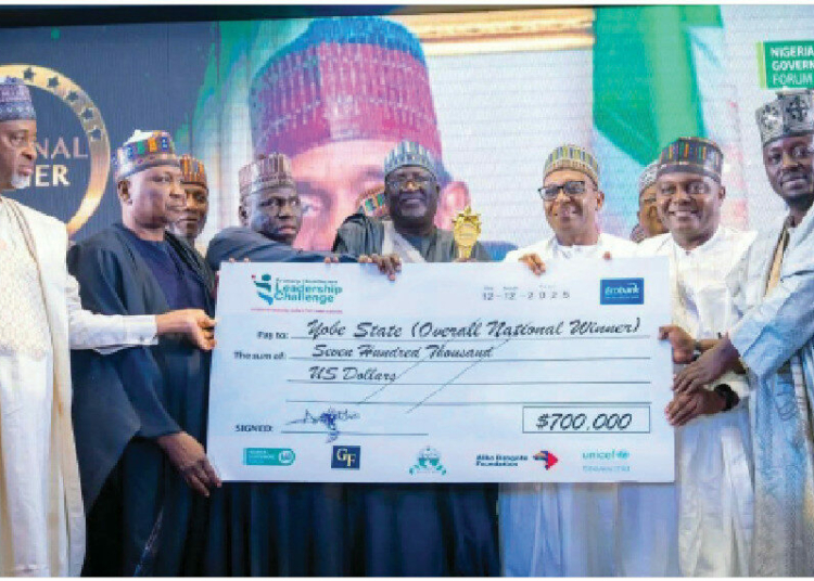 Yobe Leads Nigeria In Primary Health Care, Grabs $1.2m Award Prize 1 Forth from right, Yobe Deputy Gov, Hon Idi Barde Gubana while receiving the dummy of the cash award from the Minister of Health in Abuja recently.