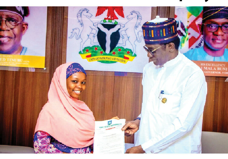 Buni Offers Automatic Employment To YSU First Class Physics Graduate 1 Yobe Gov presenting a letter of appointment to a YSU Physics best graduating student in Damaturu