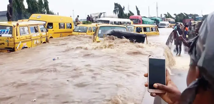 Commuters Stranded As Flooding Triggers Traffic Gridlock On Major Lagos Roads 1 Flooded Ijaiye