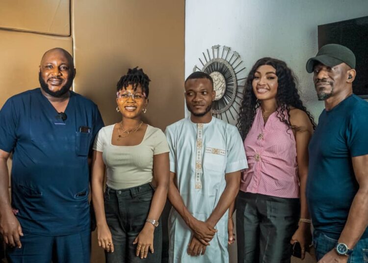 Tech Entrepreneur Hanu Donates AI Glasses To Hearing-Impaired Nigerians 1 From left: Co-ordinator of the initiative, Dr. James Nnowaluem; first and second beneficiaries, Joylyn Jacobson and Sodiq Olopade; and Marianna Orji at the presentation of the AI-smart glasses