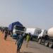 PICTORIAL: DPO Pays N310k To Settle Dispute Between Truck Drivers, Revenue Officials On Bauchi-Jos Road