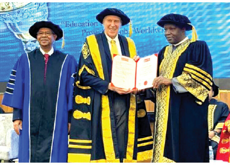 L- R: Founder and President of Lincoln University Malaysia,  Dr. Amiya Bhaumik, Chancellor, Prof. Norman Madsen, presenting the Certificate of Honorary Doctorate Degree to Gombe State Governor,  Muhammadu Inuwa Yahaya during the University's 18th Convocation Ceremony held on Monday, January 26, 2026 in Selangor,  Malaysia.