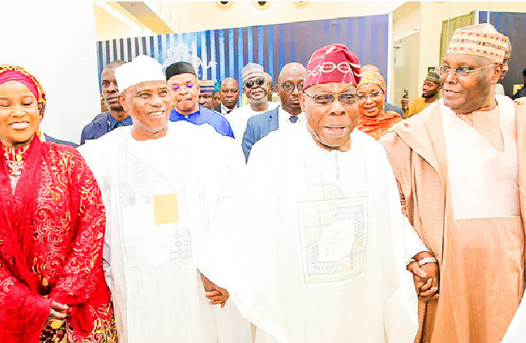 Obasanjo, Jonathan, Jega Laud Tambuwal At 60, Call for National Unity 1 L-R: Wife of the celebrant, Dr Maryam Aminu Tambuwal; the celebrant/ former Sokoto State governor, Senator Aminu Tambuwal; former President Olusegun Obasanjo and former Vice President Atiku Abubakar, during the 60th birthday symposium of Senator Tambuwal in Abuja, yesterday. PHOTO: REUBEN OJOAJOGWU GAD