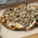 Florida Pizza Shop Receives Backlash For Serving Reptile-Topped Pie