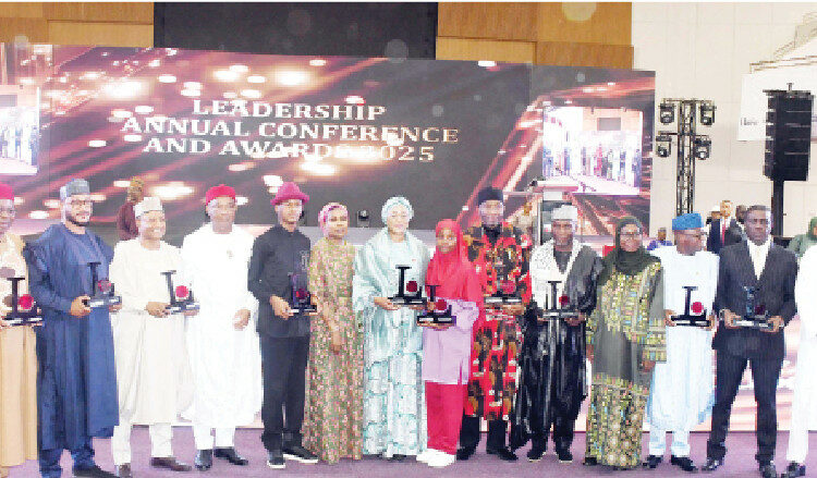 L-R: Director, Legal and Corporate Services, Green Energy International Ltd., Barr. Olusegun Ilori; representative of the Executive Chairman, Nigeria Revenue Service, Dr. Zach Adedeji/Public Service Person of the Year Awardee,  Executive Director, NRS, Shettima Tamadi; Deputy Governor, Delta State, Monday John Onyeme; Governors of the Year 2025, Dauda Lawal (Zamfara); Uba Sani(Kaduna);Hope Uzodimma(Imo); Artist of the Year 2025, Kanyeyachukwu Tagbo Okeke; Chairman, LEADERSHIP Group Ltd, Mrs. Zainab Nda-Isaiah; Person of the Year 2025, First Lady, Senator Oluremi Tinubu; College Person of the Year 2025, Nafisa Abdullahi Aminu; Legislator of the Year 2025, Rt. Hon. Benjamin Okezie Kalu; Company of the Year Award recipients: Chairman, Trade Modernisation Project (TMP), Alhaji Saleh Ahmadu, OON, Madakin Lokoja, and Managing Director, TMP, Dr. Jummai Umar-Ajijola; Chief of Staff to Ekiti State Governor, Niyi Adebayo; Banker of the Year 2025 Awardee, Dr. Tony Okpanachi;  Environmental Impact Agency of the Year 2025 Awardee, NASENI, Executive Vice Chairman/CEO of the National Agency for Science, Engineering Infrastructure (NASENI), Khalil Suleiman Halilu, and Commissioner, Corporate Services, FCCPC, Ummusalma Isyaka Rabiu; during the 18th Edition of the LEADERSHIP Annual Conference and Awards in Abuja, yesterday. PHOTO: REMI AKUNLEYAN