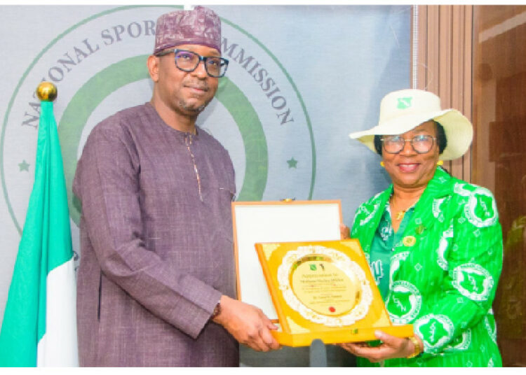 National Sports Commission Backs All Africa Challenge Trophy In Abuja 1 President of Ladies Golf Association of Nigeria Dr. Lami Onayi Ahmed making a presentation to National Sports Commission Chairman Mallam Shehu Dikko when the group visited the Chairman recently.