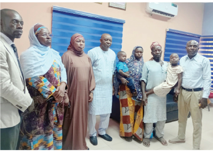 How Six Children Escaped Trafficking Ring In Niger State 1 L-R: Permanent secretary of Women Affairs Hajiya Hadiza Shiru, commissioner of Women Affairs Hadiza Idris Kuta, NAPTIP coordinator for Niger State Mr. Emmanuel Awhen, parents of the rescued twin and a NAPTIP operator during the handover of the twins in Minna yesterday. Photo: ABU NMODU