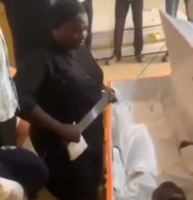 ‘Avenge Your Death For Me’, Grieving Jos Mother Places Cutlass In Slain Son’s Coffin
