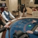 Why The Dealer Upcard Matters More Than Beginners Think 5 Players watching dealer at blackjack table