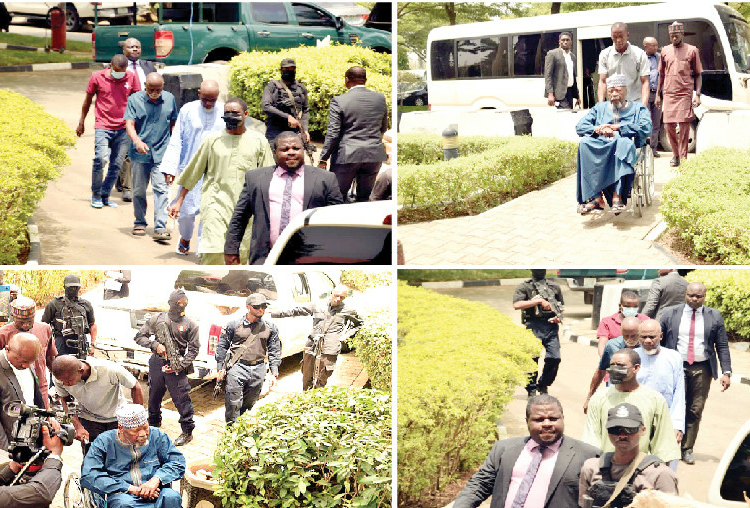 Some of the suspects linked to last year's coup plot during their arrival for arraignment at the Federal High Court, Abuja, yesterday. PHOTOS: IBRAHIM MOHAMMED