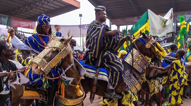 Clan of the Aleshin Osi Family ride on horses to pay homage to the king Awuja Ile of IIjebuland, during the annual Ojude Oba festival in Ijebu Ode on June 18, 2024. - Ojude Oba festival is an ancient festival celebrated by the Yoruba people of Ijebu Ode, a town in Ogun State Nigeria. This annual festival usually takes place the third day after Eid El Kabir to pay homage and show respect to the King the Awujale of Ijebuland. (Photo by TOYIN ADEDOKUN / AFP)