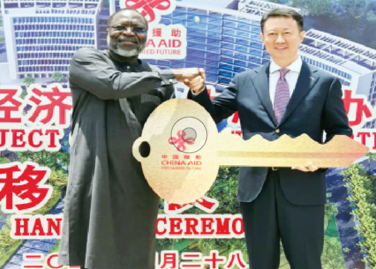 Why Nigeria Must Exploit China’s Zero-Tariff For African Products 1 L-R: President of the ECOWAS Commission, Dr. Omar Touray, receiving the key of the newly-completed headquarters of the Economic Community of West African States(ECOWAS) from the Chinese Ambassador to Nigeria, Yu Dunhai in Abuja on Tuesday Photo: Chinese Embassy