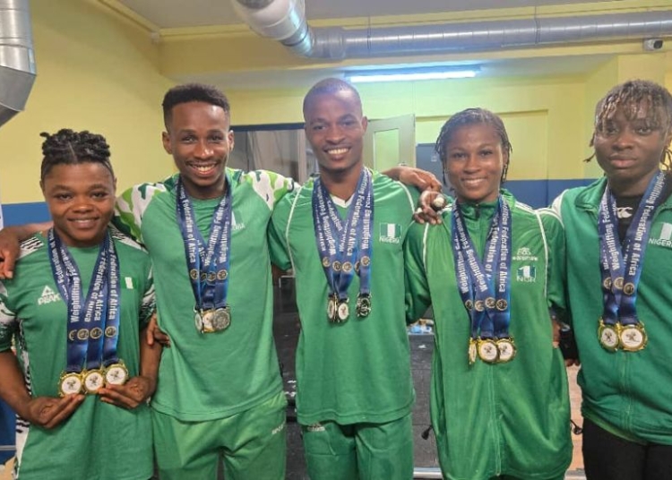 Team Nigeria Weightlifters Poses With Their Medals