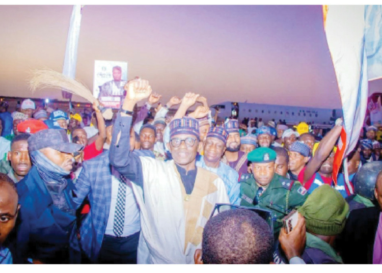 Yobe APC Will Approach 2027 Stronger, More United – Gov Buni 1 Yobe Mai Mala Buni (Middle in white) shortly after being welcomed by party loyalists at Yobe Airport in Damaturu