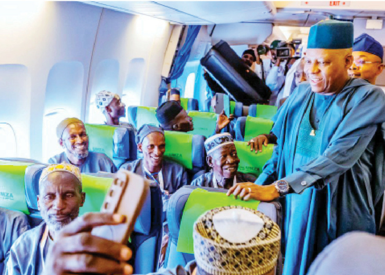 Vice President Kashim Shettima with intending Muslim pilgrims when he flagged off the 2026 Hajj airlift at the Nnamdi Azikiwe International Airport, Abuja, yesterday. PHOTO: STATE HOUSE