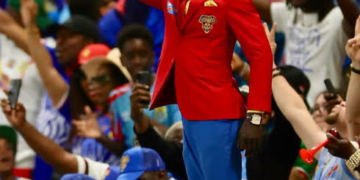 DR Congo’s Iconic ‘Lumumba’ Superfan Returns To Rally The Leopards After Ebola Quarantine 2 DR Congo’s Iconic ‘Lumumba’ Superfan Returns To Rally The Leopards After Ebola Quarantine