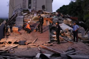 People and rescuers work on the debris of a collapsed building after a magnitude 7.2 earthquake struck Venezuela 2 062626 87a4ec68c3d8412fa2053f9926f30481 1